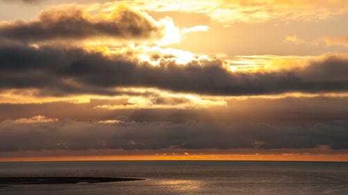 Majestic_Sun_Behind_Clouds